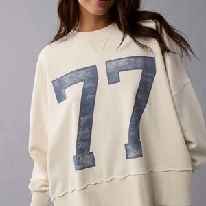 American Eagle Cream Sweatshirt with Navy 77 Print - Size Small